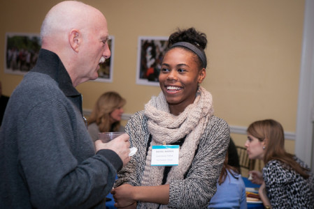 ... as well as current Fellows who volunteered with coat check and told guests about their ventures!